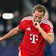 Foto: Carina Johansen / NTB Fotballspiller Harry Kane i rød Bayern München-drakt på banen. (Bildebeskrivelsen er laget av en KI-tjeneste)