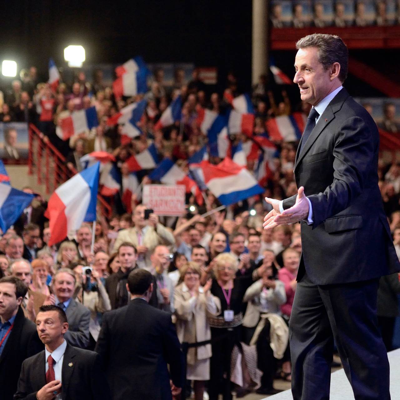 France's President and UMP party candidate for the 2012 French presidential elections Nicolas Sarkozy arrives on stage to deliver a speech at a political rally in Dijon
