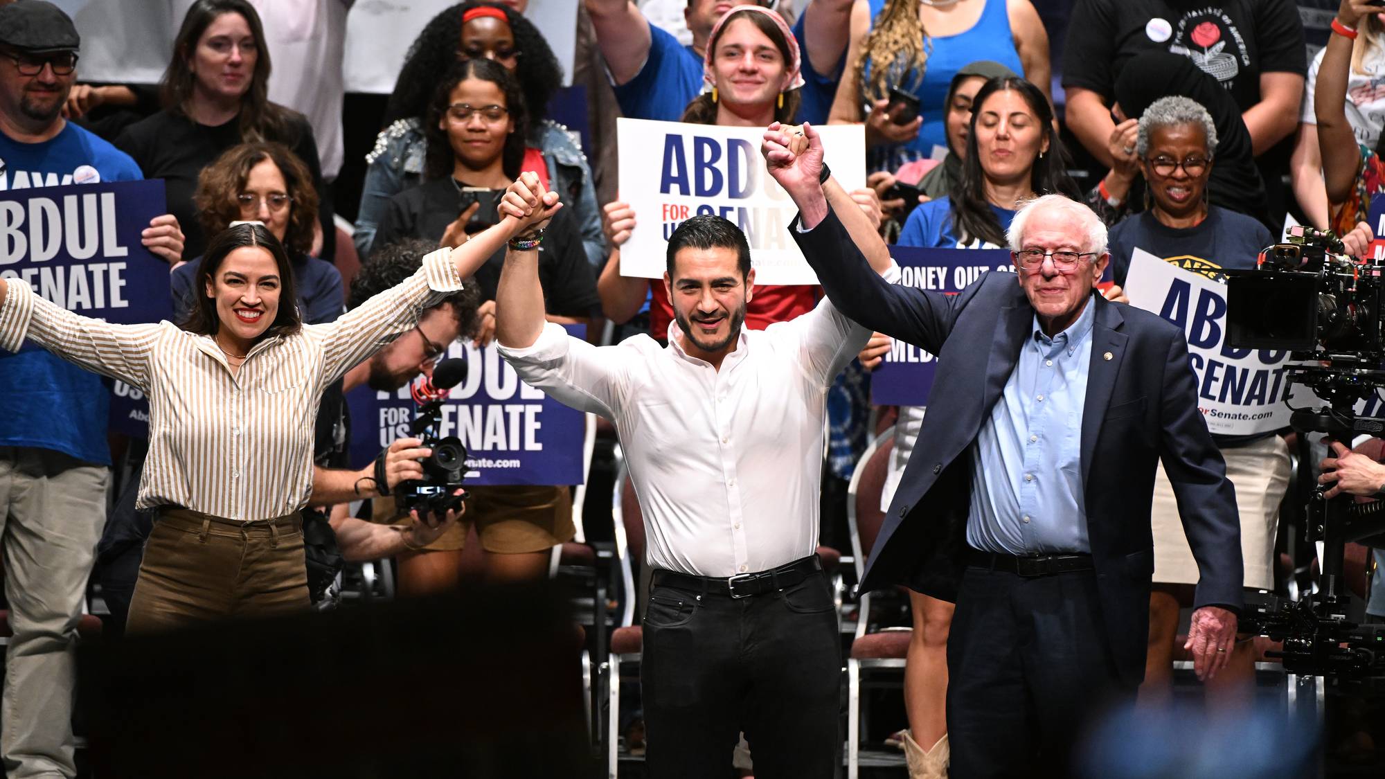 From left foreground, U.S. Rep. Alexandria Ocasio-Cortez, D-N.Y., Michigan Democratic U.S. Senate primary candidate Abdul El-Sayed, and U.S. Sen. Bernie Sanders.