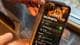 Egil Trones Christiansen / NRK en person som holder en telefon