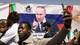 AFP Demonstrantar har plakatar med russisk flagg og bilete av Vladimir Putin