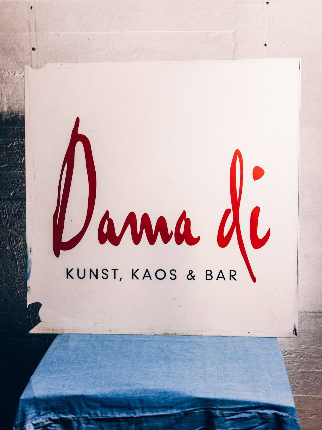 Dama di logo