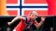 Terje Pedersen / external,NTB Erling Braut Haaland løper på en fotballbane foran et norsk flagg. (Bildebeskrivelsen er laget av en KI-tjeneste)