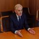 Photo: Truls Skram Lerø / NRK Jonas Gahr Støre gestures with his hands while sitting at a table and talking