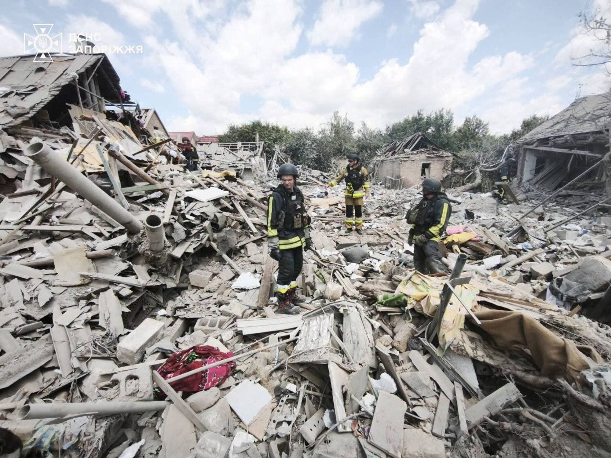 Rescuers work at a site of a Russian air strike, amid Russia's attack on Ukraine, in Zaporizhzhia, Ukraine in this handout picture released June 28, 2026. Press service of the State Emergency Service of Ukraine in Zaporizhzhia region/Handout via REUTERS ATTENTION EDITORS - THIS IMAGE HAS BEEN SUPPLIED BY A THIRD PARTY. WATERMARK FROM SOURCE. MANDATORY CREDIT. BEST QUALITY AVAILABLE.