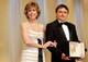 AP Romanian director Cristian Mungiu accepts the Palme d'Or from American actress Jane Fonda for his film "4 Luni, 3 Saptamini Si 2 Zile" ("4 Months, 3 weeks and 2 days"), during the awards ceremony at the 60th International film festival in Cannes, southern France, on Sunday, May 27, 2007. (AP Photo/Lionel Cironneau)