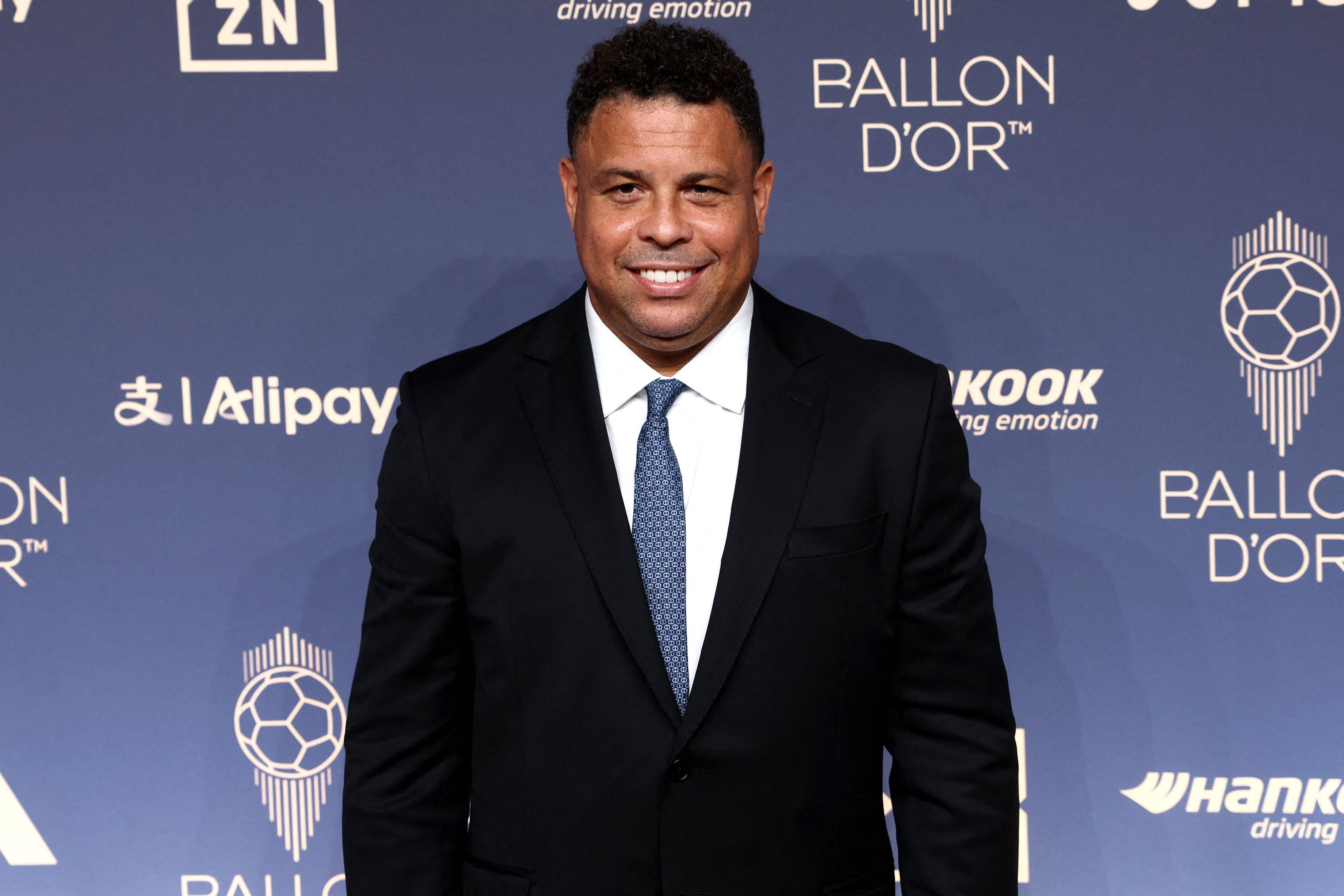 Brazilian footballer Ronaldo Nazario poses upon their arrival to attend the 2026 Ballon d'Or France Football award ceremony at the Palladium Theatre in London on October 26, 2026. (Photo by Toby Shepheard / AFP)