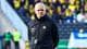 Mats Torbergsen / NTB En mann med barbert hode og svart jakke står på en fotballbane. Han har en tidtaker festet til jakken. Bak ham sitter tilskuere på tribunen. (Bildebeskrivelsen er laget av en KI-tjeneste)