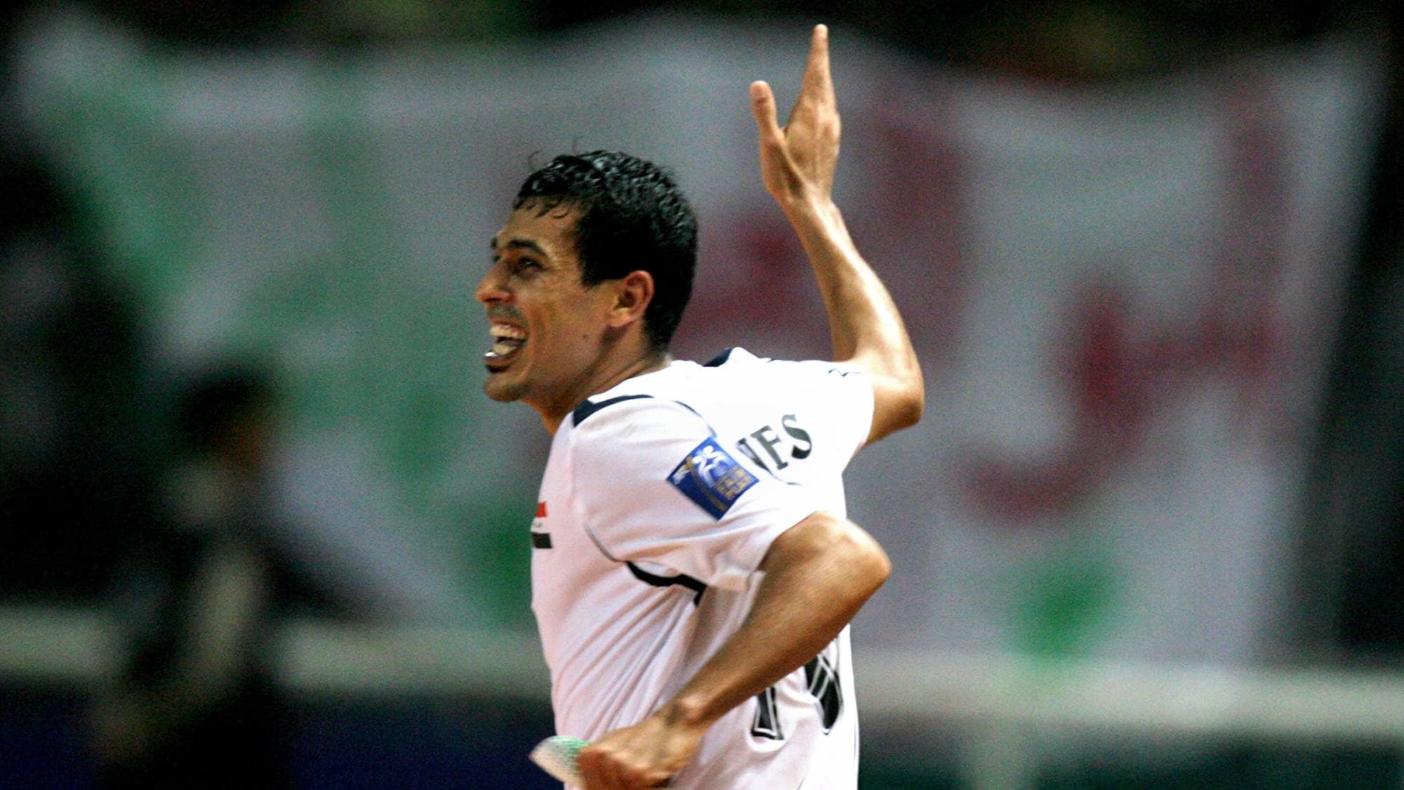 Iraq's captain Younis Mohmoud celebrates after scoring a goal against Saudi Arabia during the final match of the Asian Football Cup 2007 at the Bung Karno stadium in Jakarta, 29 July 2007. Iraq were leading 1-0 as play continues in the second half. AFP PHOTO/Bay ISMOYO