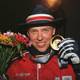 Foto: Tor Richardsen / NTB Halvard Hanevold jubler etter å ha mottatt sin olympiske gullmedalje for 20 km. skiskyting.