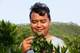Fang Yongbin / NRK Citrus farmer Wang Jing. Kreditering Fang Yongbin/NRK