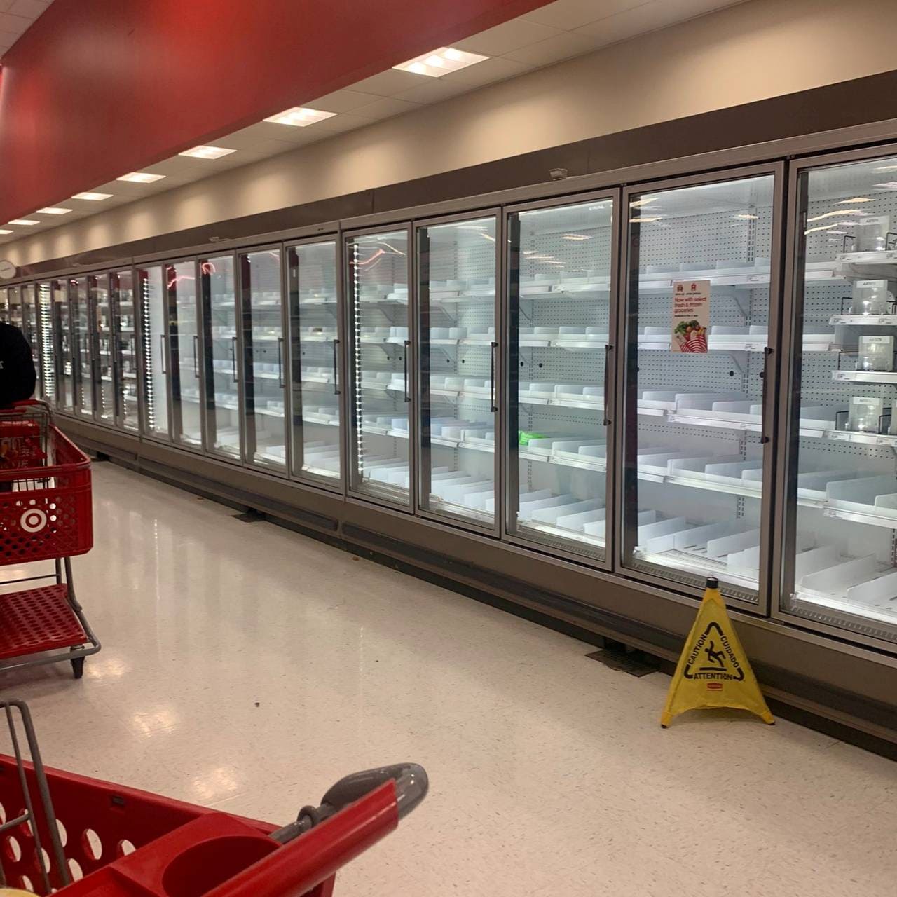 Empty shelves are seen at a supermarket in Austin, Texas