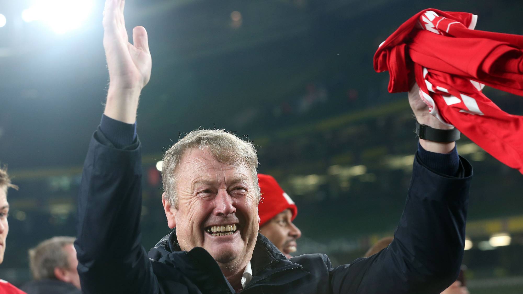 Denmark's coach Age Hareide celebrates qualifying for the finals on the pitch after the Group D Euro 2020 football qualification match between Republic of Ireland and Denmark at Aviva Stadium in Dublin, Ireland on November 18, 2019. - The game finished 1-1, Denmark qualifying for the finals. (Photo by Lorraine O'SULLIVAN / AFP)