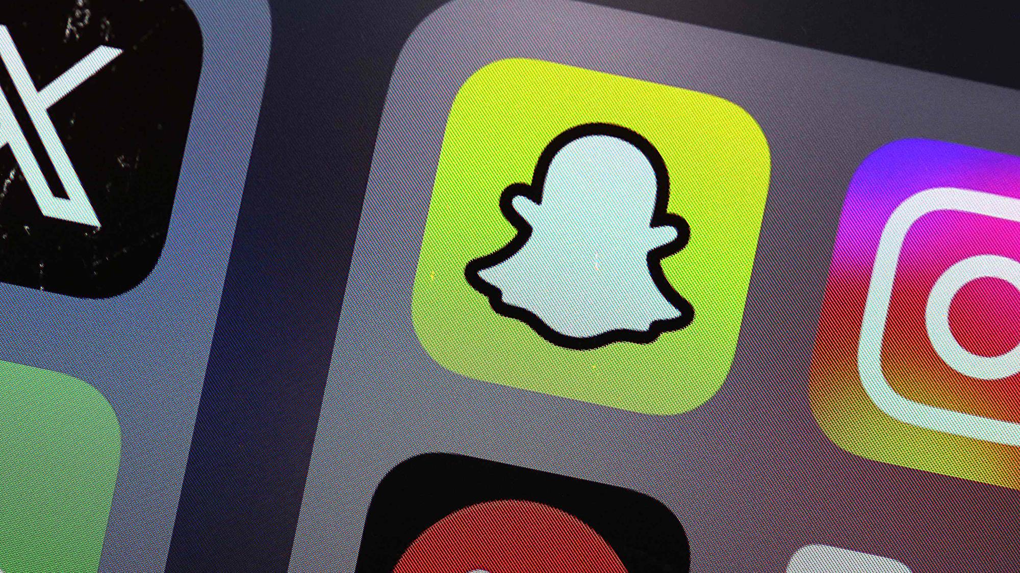 Snapchat-ikonet på en mobilskjerm med apper. (Bildebeskrivelsen er laget av en KI-tjeneste)