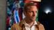 Henrik Myhr Nielsen / NRK Kristoffer Lie Løkberg med en VM-plakat i bakgrunnen