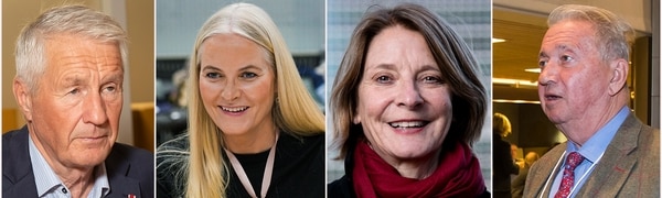 en gruppe mennesker som står sammen 