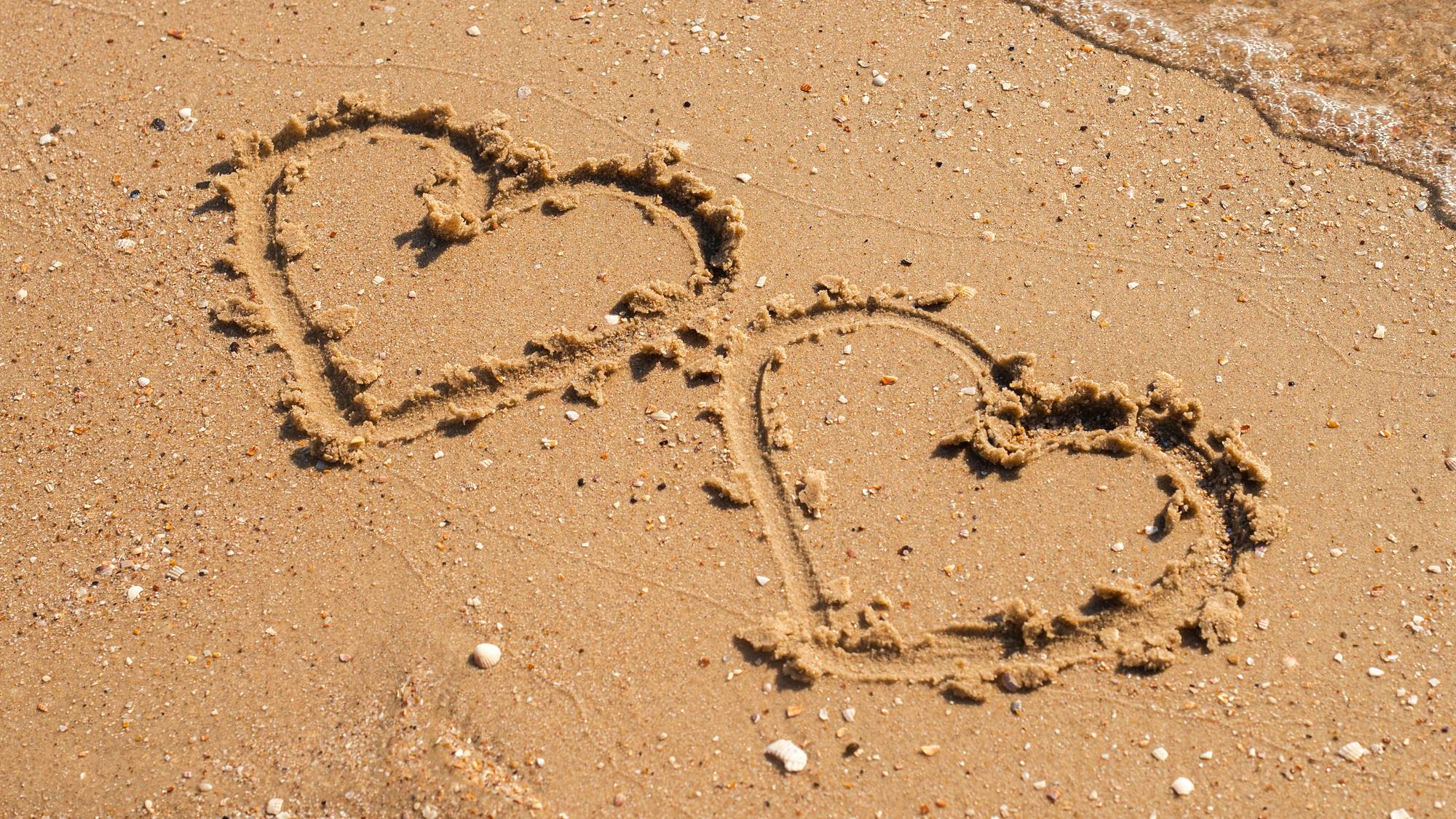 Hjerter i strand.