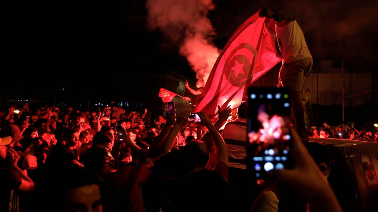 Supporters of Tunisia's President Kais Saied gather on the streets after he dismissed the government and froze parliament, in Tunis