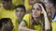Foto: PATRIK STOLLARZ / AFP,NTB Skuffet Brasil-supporter.
