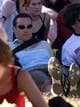 Erik Johansen / NTB Kronprins Haakon på Quartfestivalen i 1999, han ligger i gresset og har på seg solbriller.